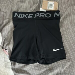 black Nike pros, new with tags, size extra small